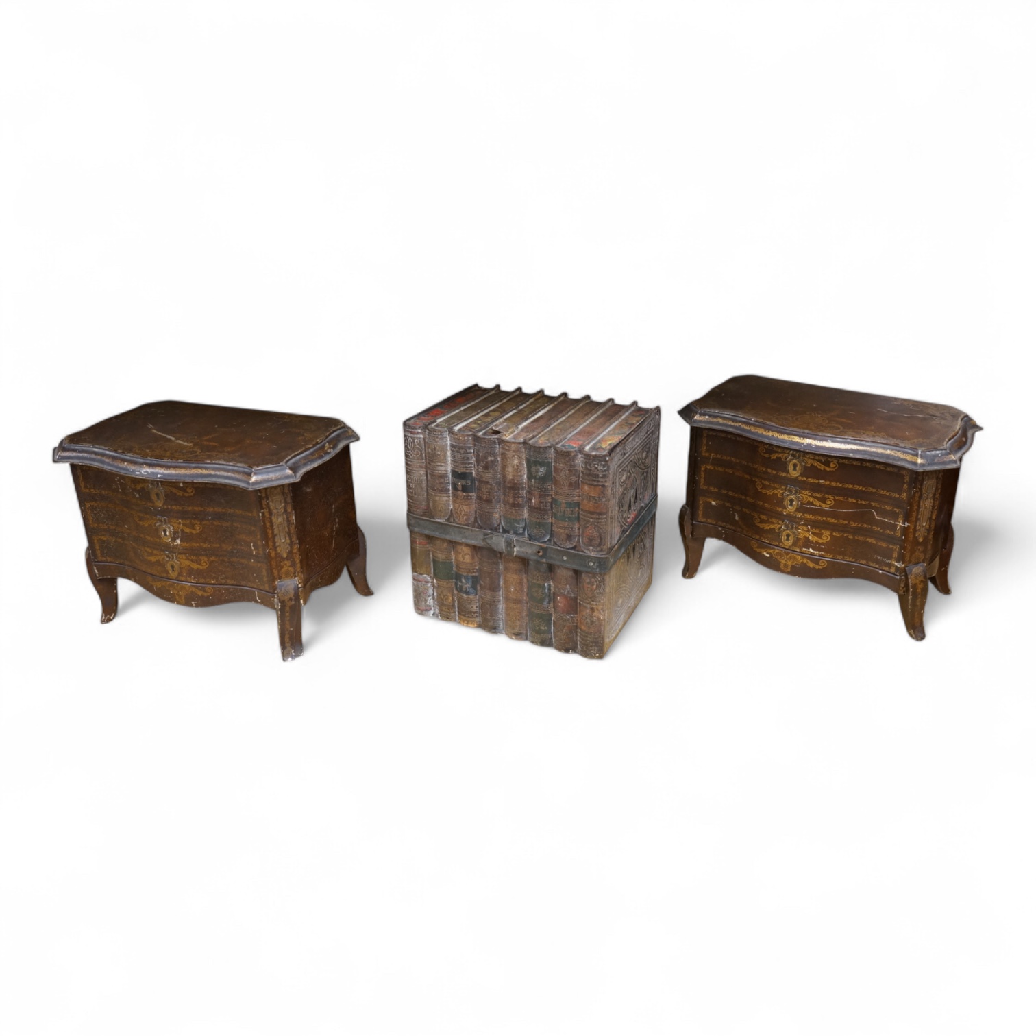 A Huntley and Palmer biscuit tin, modelled as a set of books and and two Mcvitie and Price tins modelled as French chests, tallest 16cm